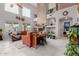 Bright living room featuring a floor-to-ceiling fireplace, neutral colors, and an open concept design at 4801 E Quien Sabe Way, Cave Creek, AZ 85331