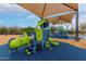 Colorful playground structure with slides, climbing features, and shade canopy in a community park setting at 4801 E Quien Sabe Way, Cave Creek, AZ 85331