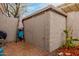 Exterior shot of a backyard storage shed, providing ample space for gardening tools and outdoor equipment at 4801 E Quien Sabe Way, Cave Creek, AZ 85331