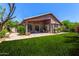 Expansive backyard with a covered patio, perfect for outdoor gatherings and enjoying the serene setting at 5031 W Ivanhoe St, Chandler, AZ 85226