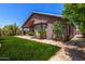 Home exterior showcasing well-maintained landscaping and an inviting backyard area at 5031 W Ivanhoe St, Chandler, AZ 85226