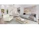 Bright, open-concept living and dining area with modern decor and sleek, neutral furnishings at 5031 W Ivanhoe St, Chandler, AZ 85226