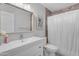 Bathroom featuring single sink vanity with drawers and walk-in shower at 5615 W Tonopah Dr, Glendale, AZ 85308