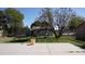 Wide backyard view showing a trampoline and a playhouse with a slide at 6212 S 12Th St, Phoenix, AZ 85042