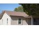 Classic home with a newer roof, neutral color scheme, and welcoming covered porch at 6212 S 12Th St, Phoenix, AZ 85042