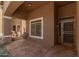 Inviting front porch with decorative tile and a charming entrance to the home at 6829 S 58Th Ave, Laveen, AZ 85339