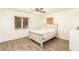 Bright bedroom with a bed and hardwood floors, illuminated by natural light at 6842 N 10Th Pl, Phoenix, AZ 85014