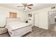 Serene bedroom featuring a ceiling fan and wood-look floors with ample natural light at 6842 N 10Th Pl, Phoenix, AZ 85014