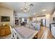 Dining area that opens up to the living room and kitchen at 7317 W Southgate Ave, Phoenix, AZ 85043