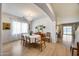 Elegant dining room featuring a chandelier and bright windows at 7317 W Southgate Ave, Phoenix, AZ 85043