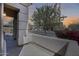 Street view from home's front porch showing tree and street sign at 7317 W Southgate Ave, Phoenix, AZ 85043