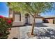 Two-story home featuring three-car garage and stucco walls at 7317 W Southgate Ave, Phoenix, AZ 85043