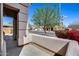 Front porch view with lush landscaping and view of the neighborhood at 7317 W Southgate Ave, Phoenix, AZ 85043