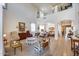 Spacious living room with high ceilings, clerestory windows, and lots of natural light at 7317 W Southgate Ave, Phoenix, AZ 85043