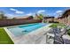 Backyard pool with patio and lounge chairs, a relaxing outdoor retreat at 7317 W Southgate Ave, Phoenix, AZ 85043