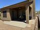 Back patio showcasing a ceiling fan and space for seating, ideal for outdoor dining at 7361 E Rugged Ironwood Rd, Gold Canyon, AZ 85118