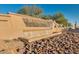 Elegant MountainBrook Village waterfall entrance sign set in a desert landscape at 7361 E Rugged Ironwood Rd, Gold Canyon, AZ 85118