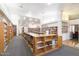 Bright and open library with rows of bookshelves and comfortable reading areas at 7361 E Rugged Ironwood Rd, Gold Canyon, AZ 85118