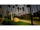 Nighttime shot of Arrowhead Country Club sign surrounded by palm trees at 7401 W Arrowhead Clubhouse Dr # 2045, Glendale, AZ 85308