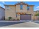 Two-story home showcasing a brown garage door and neutral stucco exterior with well-kept landscaping at 857 S Osborn Ln, Gilbert, AZ 85296