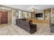 Inviting living room featuring comfortable seating, entertainment center and tile flooring at 857 S Osborn Ln, Gilbert, AZ 85296