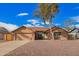 Charming single-story home with a well-maintained yard and two-car garage at 8738 W Mountain View Rd, Peoria, AZ 85345