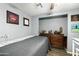 Bedroom featuring gray colored walls and bed plus a wooden dresser at 10243 E Illini St, Mesa, AZ 85208