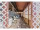 Covered patio area with ceiling fan and white gravel at 10243 E Illini St, Mesa, AZ 85208