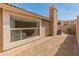 View of the backyard featuring desert landscaping with a brick patio and space for outdoor activities at 13828 S 42Nd St, Phoenix, AZ 85044