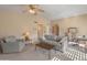 Bright living room offering a modern sofa, neutral color palette, and seamless flow at 13828 S 42Nd St, Phoenix, AZ 85044