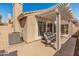 Inviting covered patio area with comfortable seating, providing a relaxing outdoor living space with a pergola at 13828 S 42Nd St, Phoenix, AZ 85044