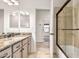 Bathroom with a tiled shower, granite vanity top, and wood-look floors at 14244 N 14Th Pl, Phoenix, AZ 85022