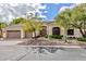 Inviting single-story home boasts a three-car garage and desert landscaping for low maintenance at 14244 N 14Th Pl, Phoenix, AZ 85022