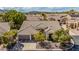 Stunning aerial view of the property showcasing the tile roof and lush landscaping at 14244 N 14Th Pl, Phoenix, AZ 85022