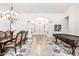 Dramatic foyer featuring wood floors, high ceilings, chandeliers and views of front entry doors at 14244 N 14Th Pl, Phoenix, AZ 85022