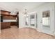 Dining area with bay window, tile floors, and easy access to the updated kitchen at 1614 W Beaubien Dr, Phoenix, AZ 85027