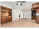 Charming kitchen with custom cabinetry and granite counters near an adjoining living space at 1614 W Beaubien Dr, Phoenix, AZ 85027