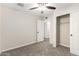 Bedroom features include neutral walls, ceiling fan, and closet with sliding doors at 17408 N 14Th Ave, Phoenix, AZ 85023