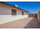 Wide angle exterior of home with brick patio and privacy wall at 17408 N 14Th Ave, Phoenix, AZ 85023