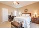 Comfortable bedroom showcasing neutral tones, a ceiling fan, and ample natural light at 1951 N 64Th St # 26, Mesa, AZ 85205