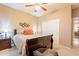 Inviting bedroom with warm lighting, a wood-framed bed, and a stylish bedside table at 1951 N 64Th St # 26, Mesa, AZ 85205