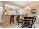 Inviting dining area adjacent to the kitchen, complete with table and chairs at 1951 N 64Th St # 26, Mesa, AZ 85205