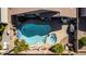 Aerial view of the backyard featuring a pool, spa, and lounge area at 202 W Twin Peaks Pkwy, San Tan Valley, AZ 85143