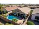 Aerial view of the backyard, pool, and patio area at 202 W Twin Peaks Pkwy, San Tan Valley, AZ 85143