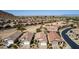 An aerial view of an Arizona neighborhood with desert landscaping and mountain views at 202 W Twin Peaks Pkwy, San Tan Valley, AZ 85143