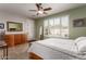 Bright bedroom featuring a bed, dresser, mirror, and natural light at 202 W Twin Peaks Pkwy, San Tan Valley, AZ 85143