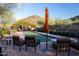 Relaxing bocce ball court surrounded by comfortable seating and scenic landscaping at 202 W Twin Peaks Pkwy, San Tan Valley, AZ 85143