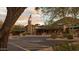 A picturesque community center featuring desert landscaping and American flag at 202 W Twin Peaks Pkwy, San Tan Valley, AZ 85143