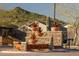 The Solera community entrance features native plants and a stone monument with community signage at 202 W Twin Peaks Pkwy, San Tan Valley, AZ 85143