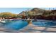 Resort-style community pool and spa with mountain views and desert landscaping at 202 W Twin Peaks Pkwy, San Tan Valley, AZ 85143